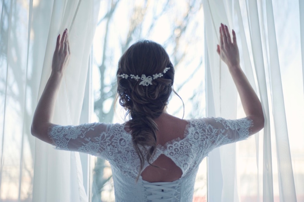bride looking out window