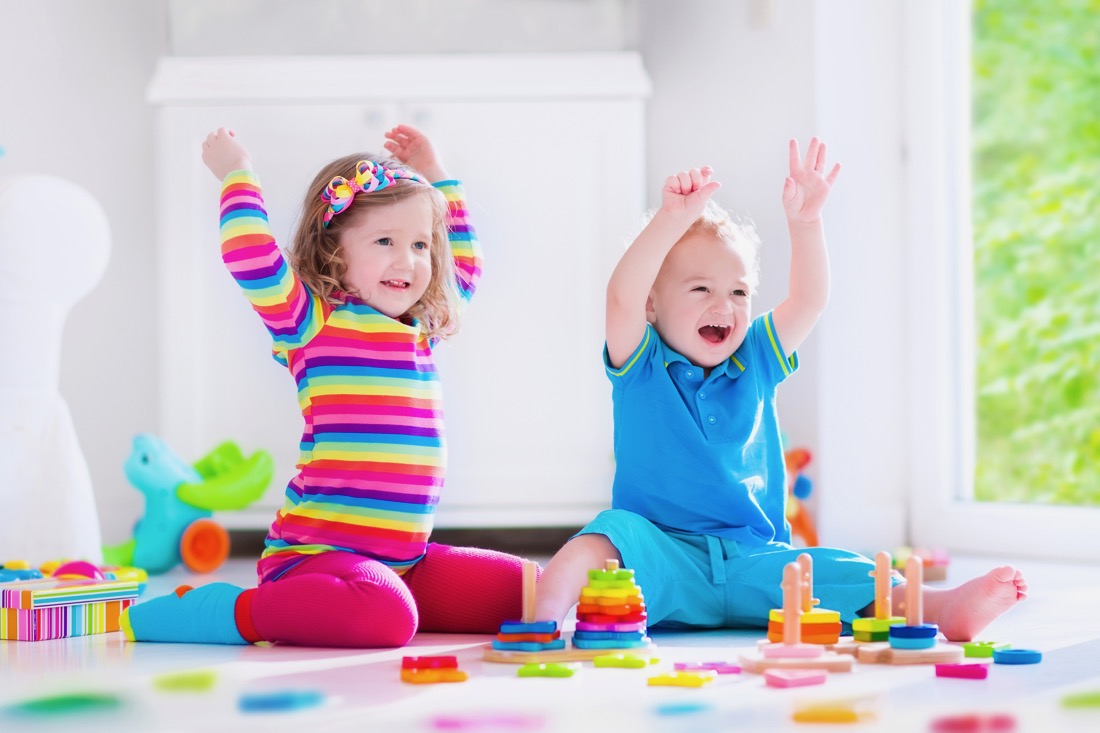 Kids playing with wooden blocks